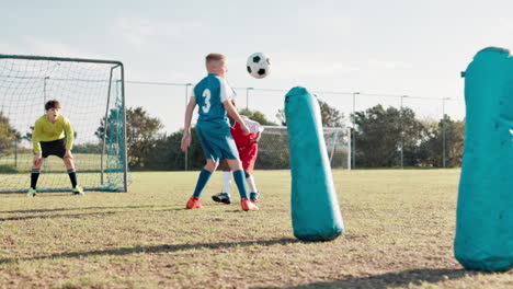 kids practicing soccer on the field