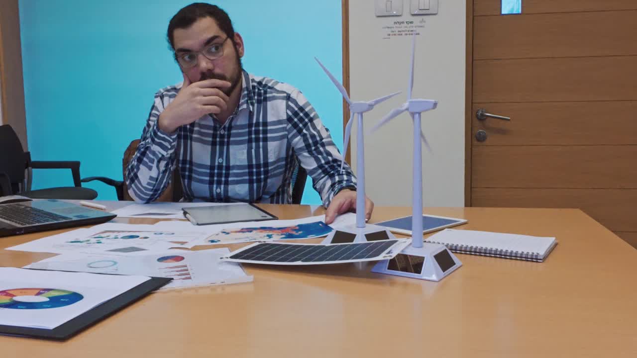 Thoughtful Architect Contemplating a Sustainable Design Challenge