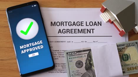 mortgage approved notification. concept of getting in debt to buy a home. mortgage agreement.