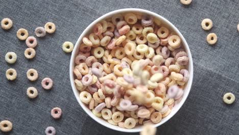 colorful ring cereal in a white bowl