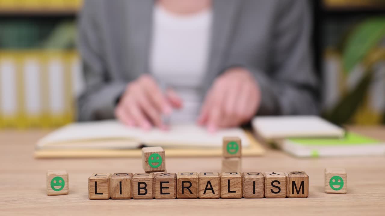 Liberalism Concept with Wooden Blocks