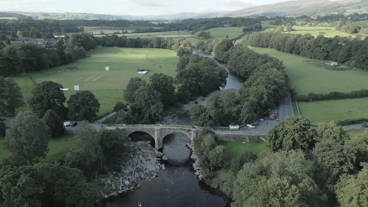 An aerial view of the Devil's Bridge at Kirkby Lonsdale on a summer evening, Yorkshire, England, UK