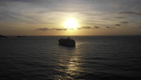 The-World-cruise-ship-morning-sun-sunrise-Devon-UK