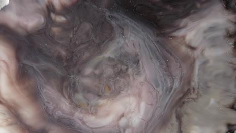 Motion-video-of-abstract-boiling-of-greyish-white-fluid