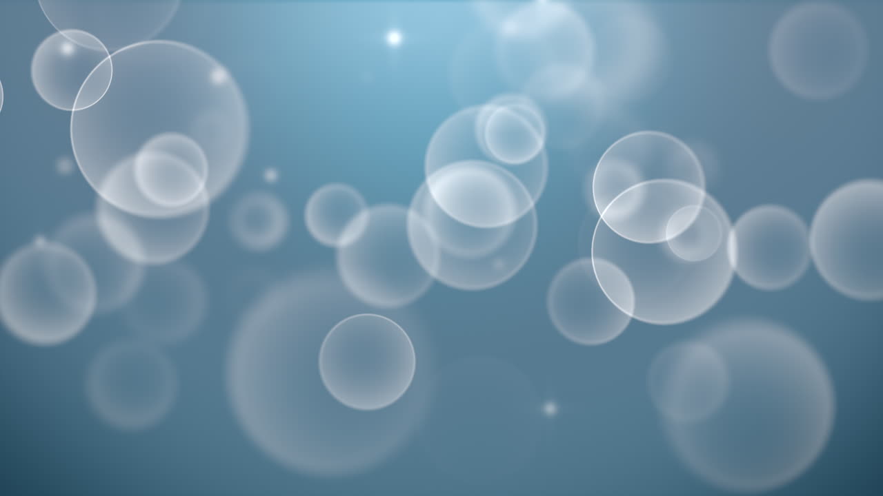 진한 파란색 배경에 모션 및 비행 흰색 입자 및 둥근 보케