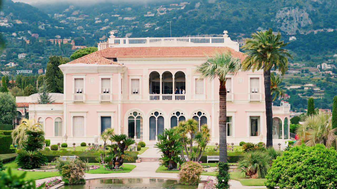 Saint-Jean-Cap-Ferrat, France - April 17, 2025: View of the Villa Ephrussi de Rothschild Museum surrounded by greenery