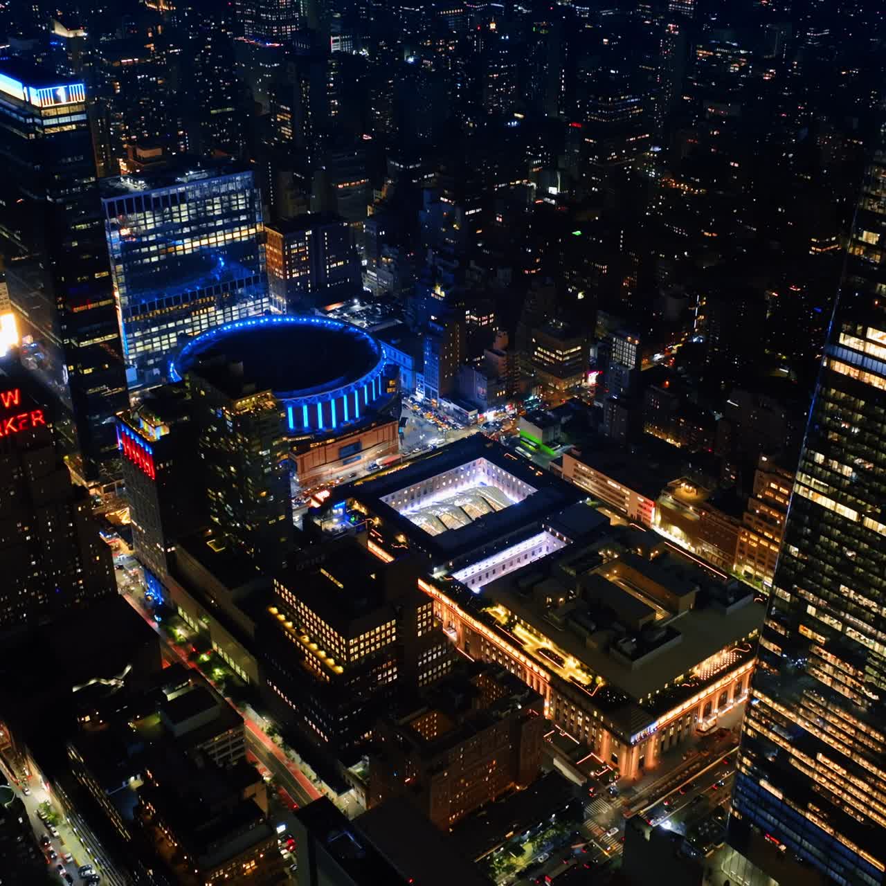 Downcast footage above breath-taking New York at night. Sparkling cityscape of never sleeping metropolis from top