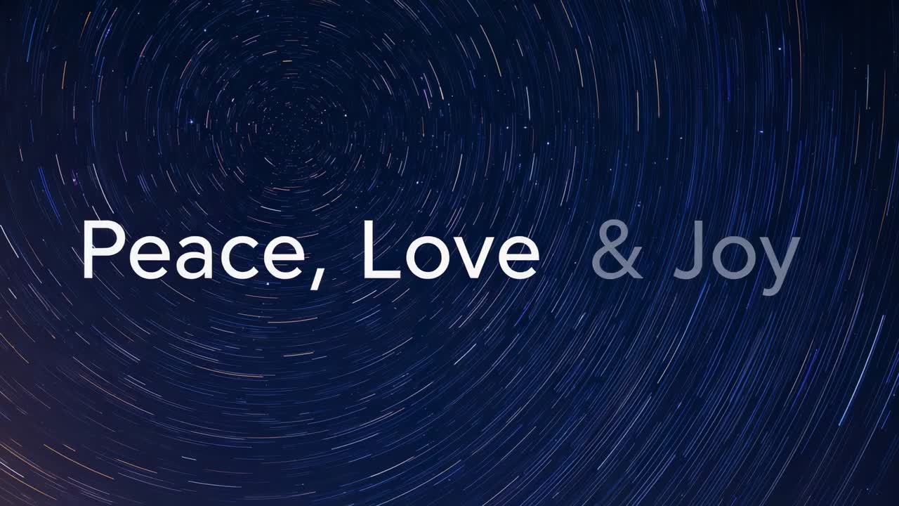 Showing centered sansserif text Peace, Love and Joy over navy sky, with exposure moving star trail