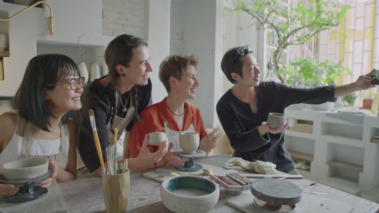 Students and Teacher Taking Selfie on Pottery Lesson