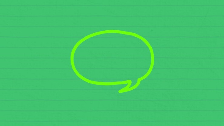 Hand Drawing a Speech Bubble on a Green Background