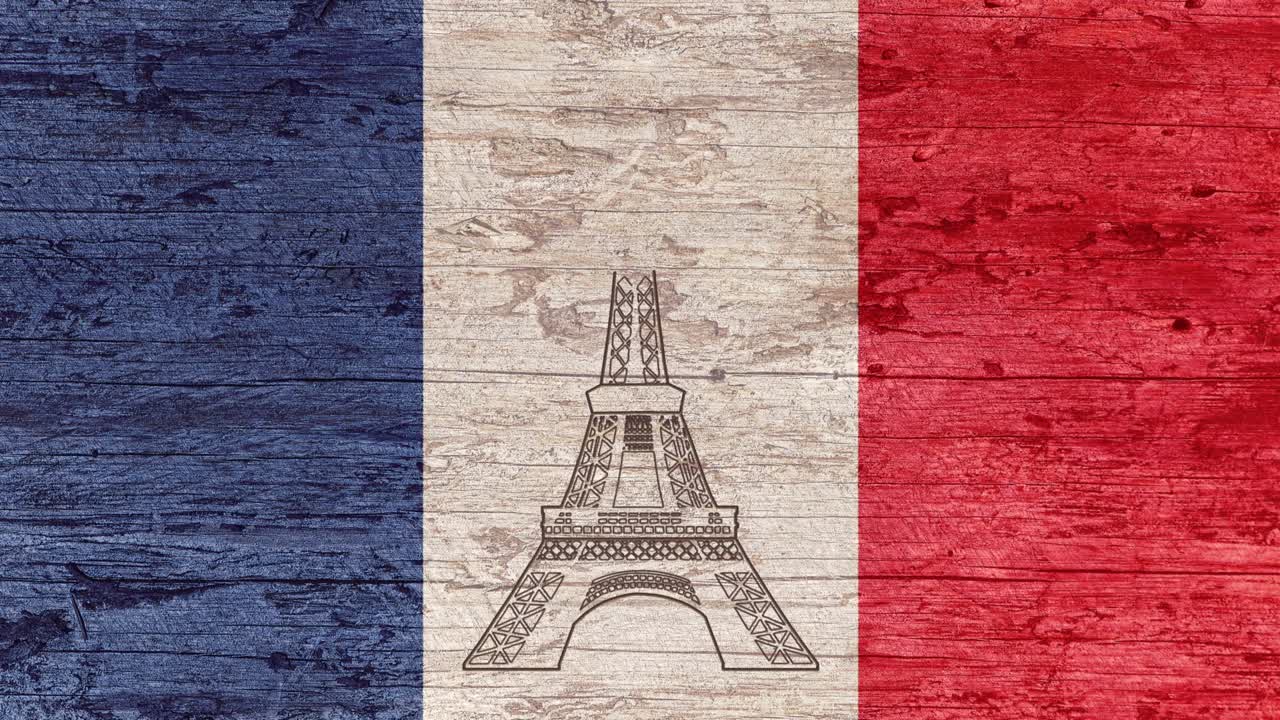 에펠탑의 애니메이션은 프랑스 발이 그려진 나무 테이블에 새겨져 있습니다. art.line art.travel to france.tour eiffel paris