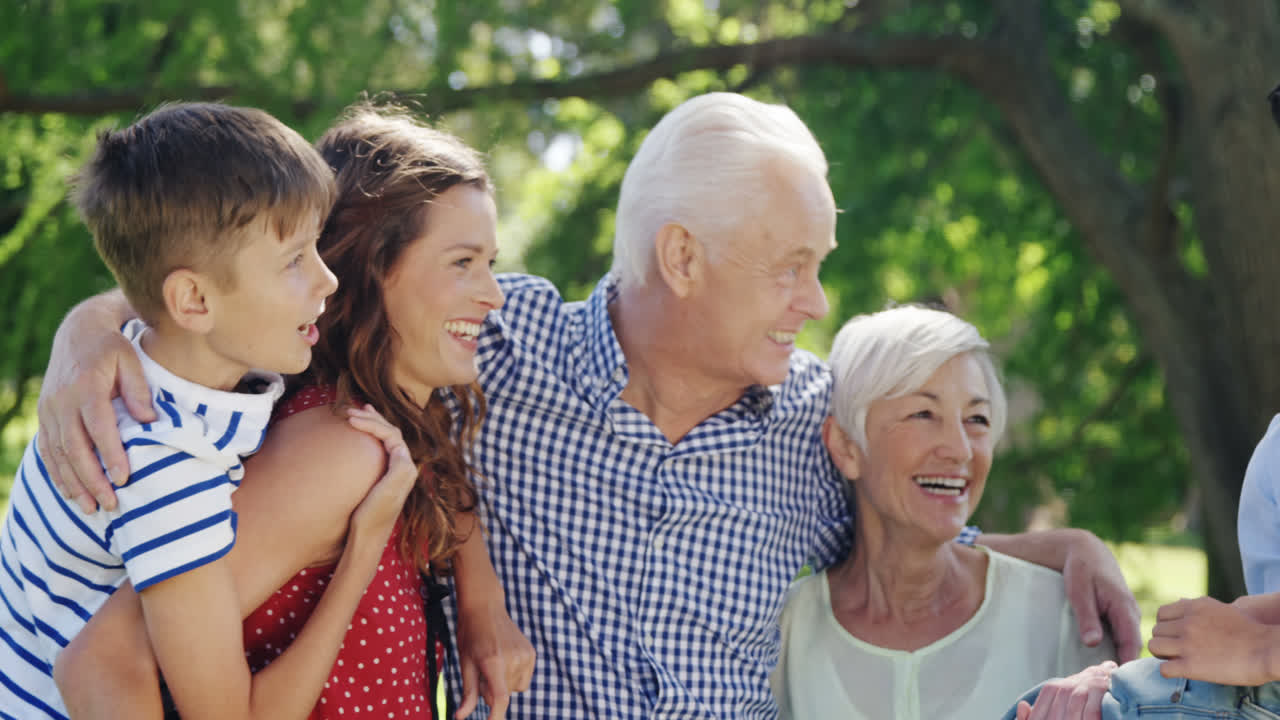 Multi-generation family having fun in the park
