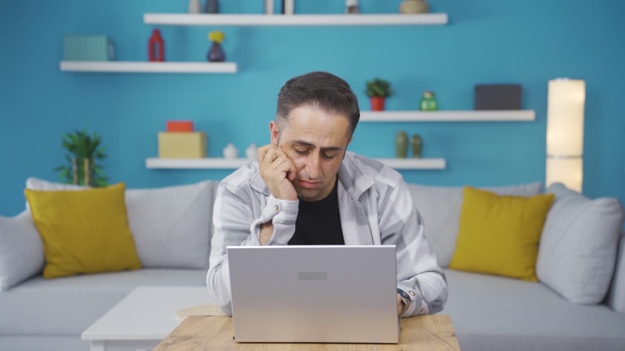 The man who can't use the application on the laptop.