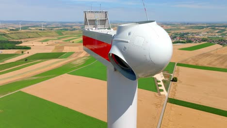 the head of the wind turbine is presently undergoing construction - close up