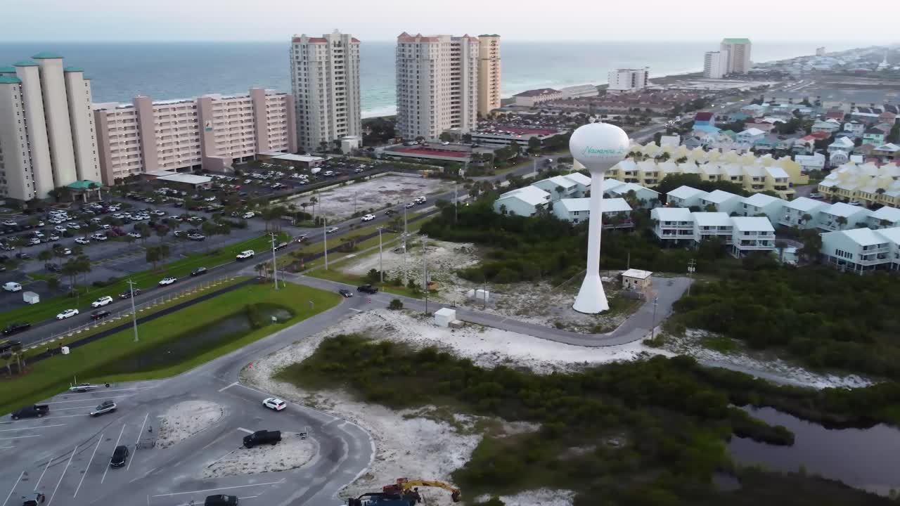 Pensacola Navarre Beach, coastal city with Florida Pier and Beach, Navarre Beach along Florida's Gulf Coast. Air view of Navarre Pier in West Florida. Drone view of this beautiful city