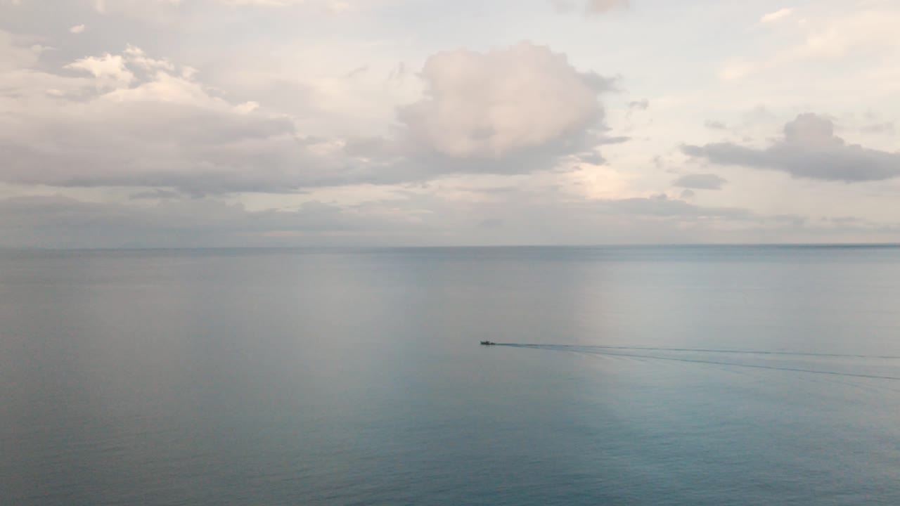 Lonely Boat on a Calm Ocean