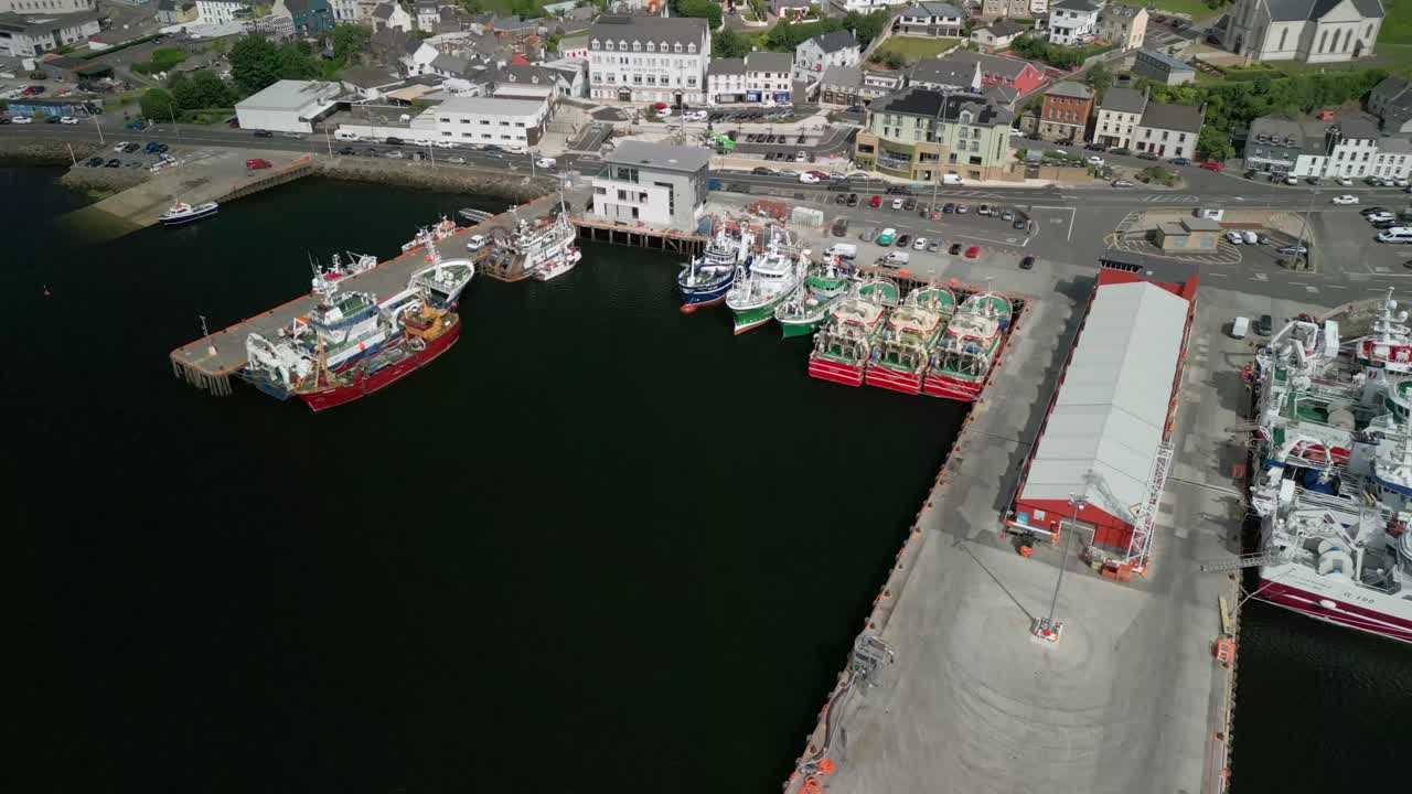 Wide reversing aerial video of Killybegs Harbour on the Wild Atlantic Way in County Donegal, Ireland. Filmed in 4K, 60FPS and with Rec709 color.