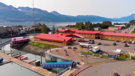 4k drone video of us coast guard station in valdez boat harbor in valdez, alaska during sunny summer day