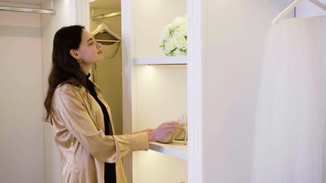 caucasian woman in wedding dress shop