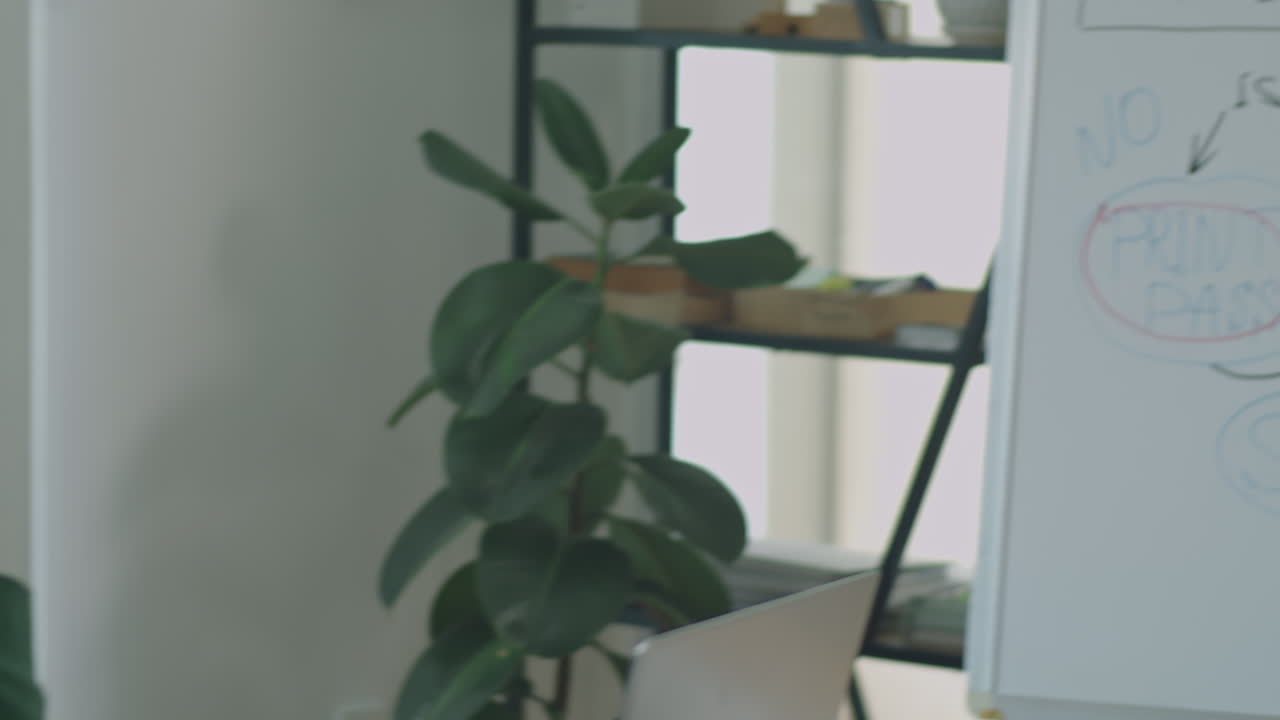 Gen Z Man Giving Presentation on Team Meeting