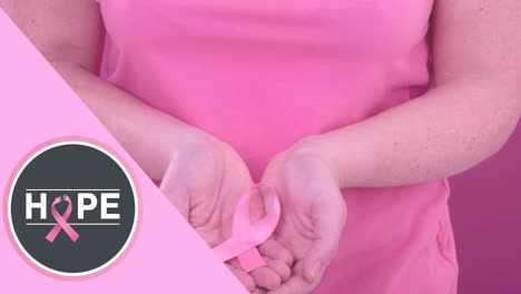 animation of breast cancer awareness text over caucasian woman