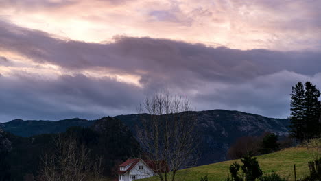 Dark-clouds-over-the-mountains-of-Bratthetland,-Norway---Timelapse