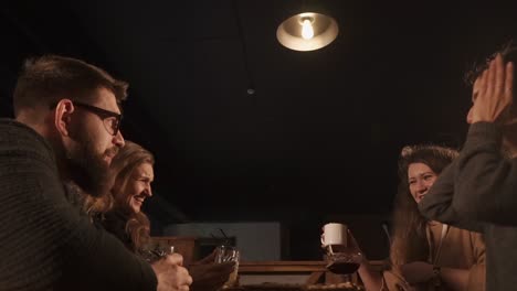 friends enjoying conversation in a restaurant