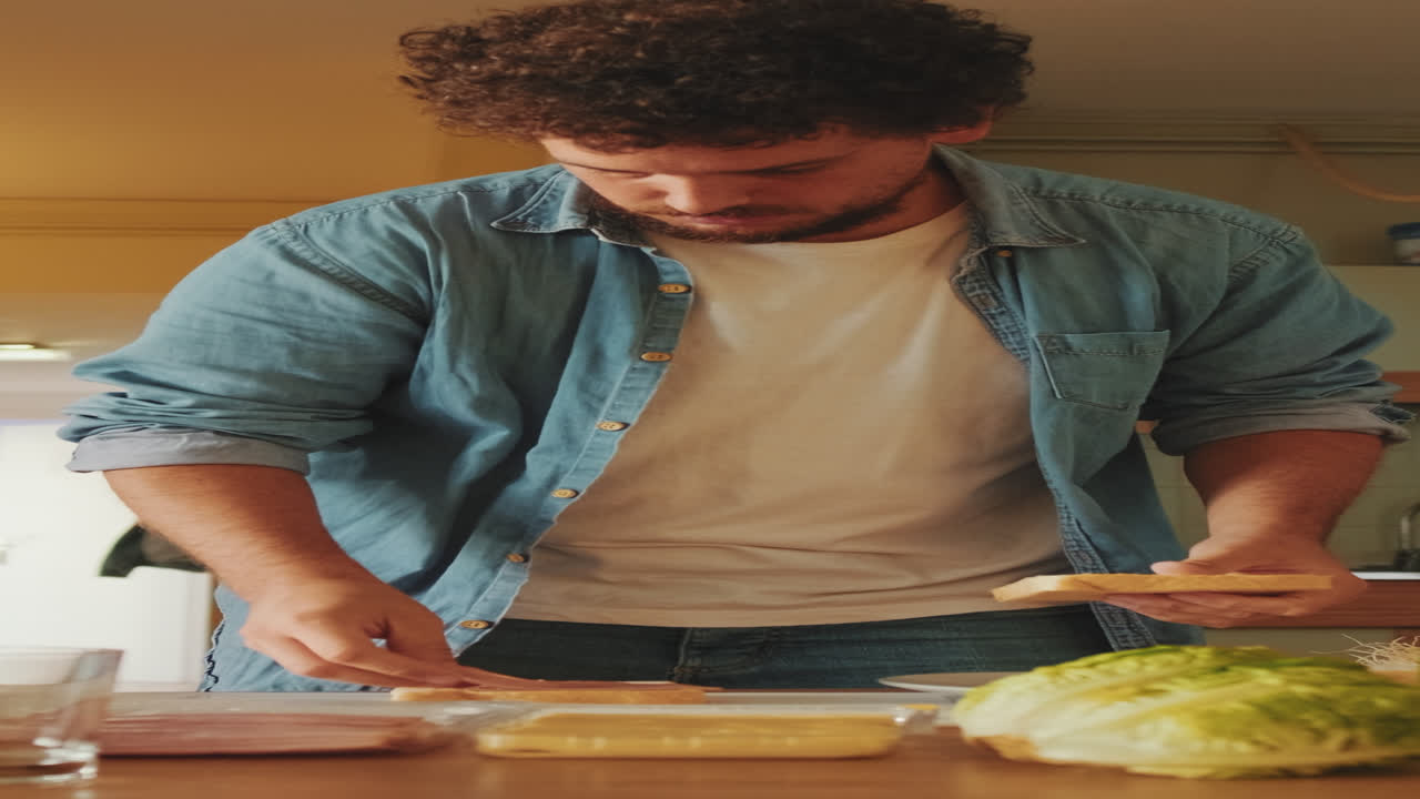 Man Making a Sandwich in the Kitchen