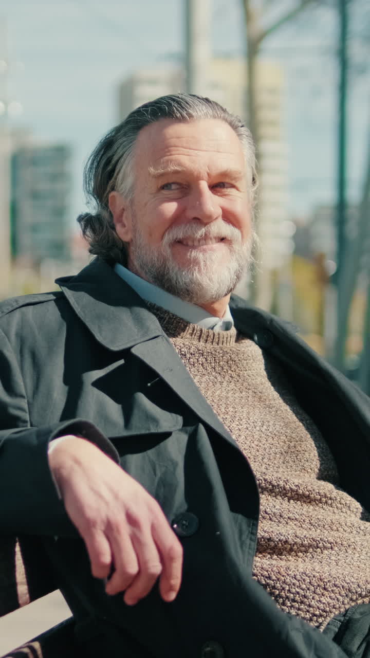 Happy Senior Man Smiling in the Park