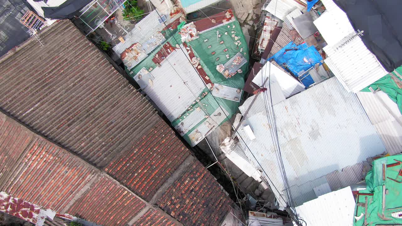 Hong Kong rundown slum houses populated by squatters, in the outskirts of Kowloon bay, Top down aerial view