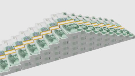 many wads of money. 50 chinese yuan banknotes. stacks of money.