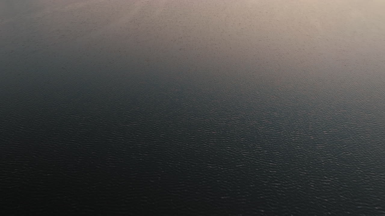 Aerial views of a lake at sunset in North Carolina