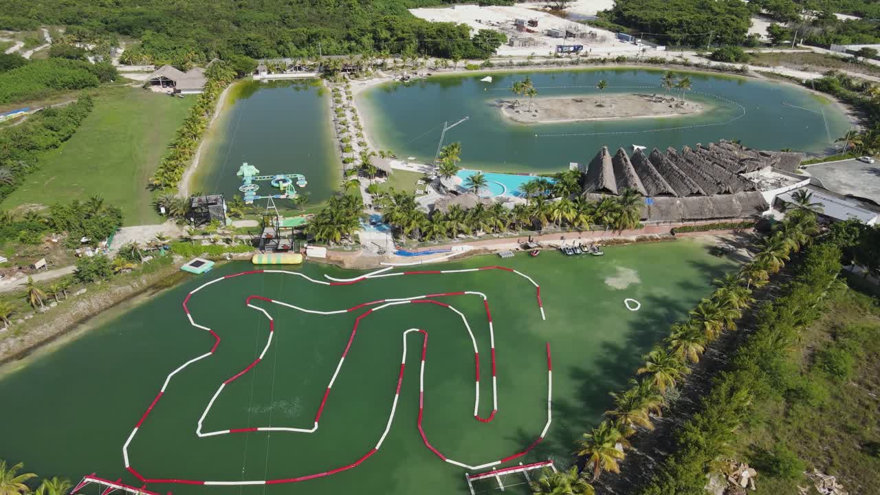 Caribbean Lake Park with water attractions, Punta Cana, Dominican Republic. Aerial drone pov
