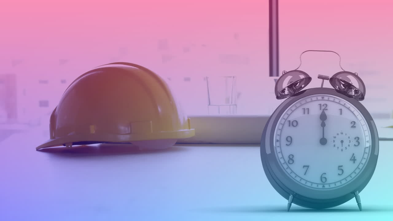 Animation of clock moving over helmet and roll lying on desk