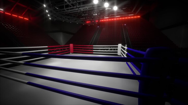 Arena di pugilato vuota con riflettori sul ring