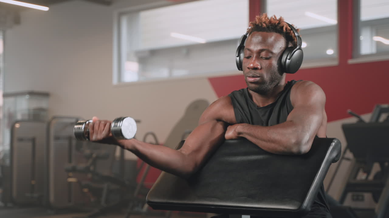 Man Working Out in Gym