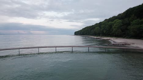 Low-Level-Drone-Shot-of-the-Round-Bridge-near-Marselisborg-Palace-in-Aarhus,-Denmark