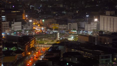 wongwian yai roundabout. aerial view of highway junctions. roads shape circle in structure of architecture and technology transportation concept. top view. urban city, bangkok at night, thailand.