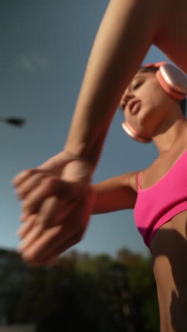 woman stretching outdoors