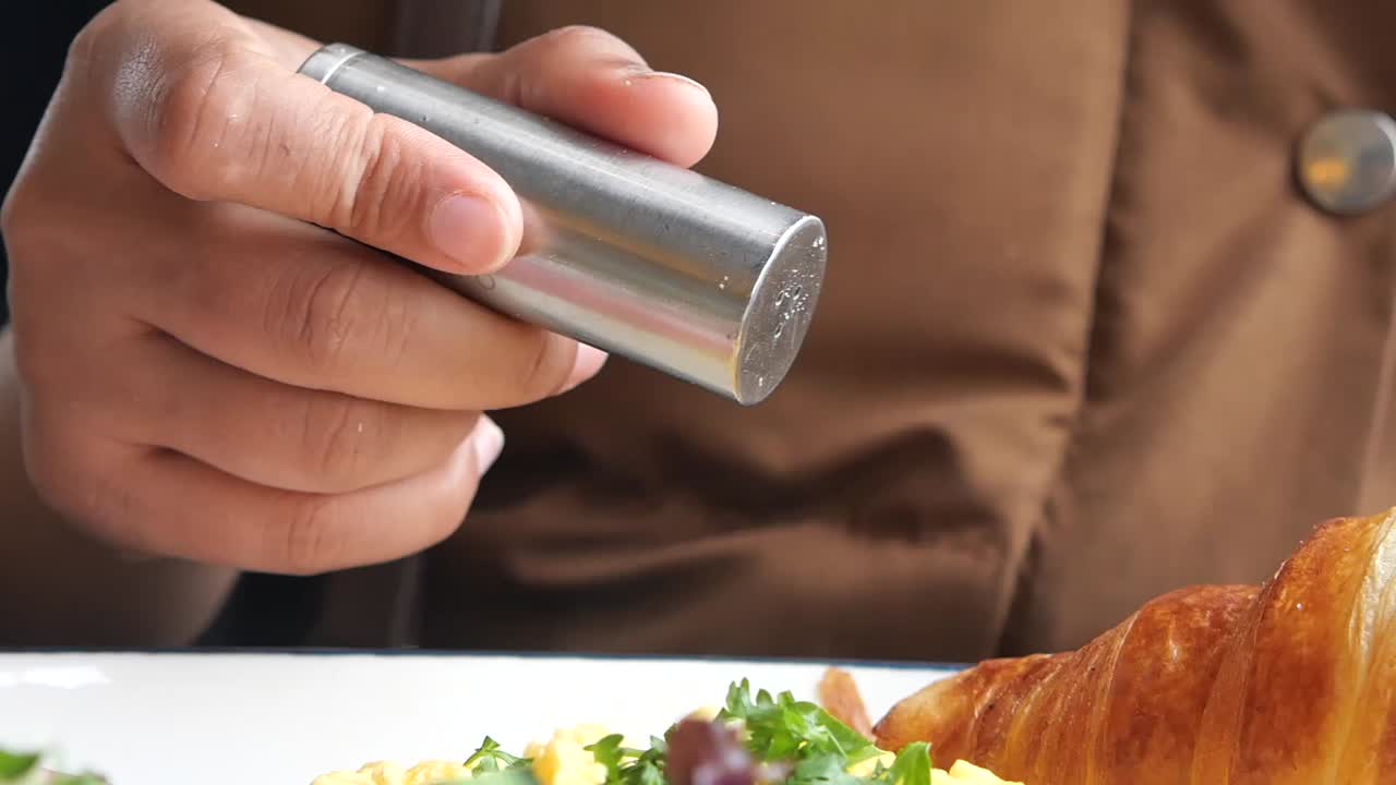 Breakfast with Croissant and Eggs