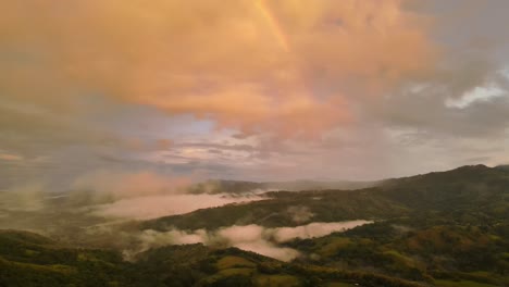 flight over the mist and rainbow in the dense tropical forests of costa rica, 4k