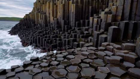 giant's causeway: basalt columns and ocean waves