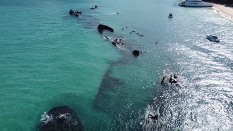 vessels and tourists visiting tangalooma shipwrecks australia. aerial