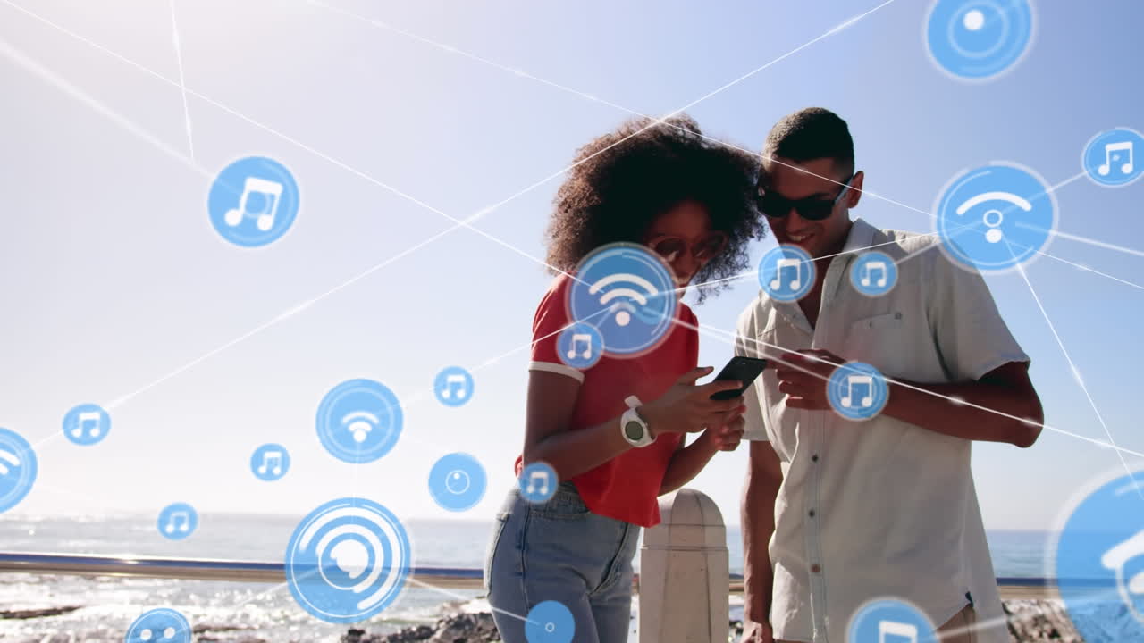 animación de una red de conexiones sobre una pareja feliz en la playa