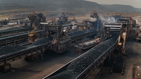 large-scale industrial coal mining operation with conveyor belts