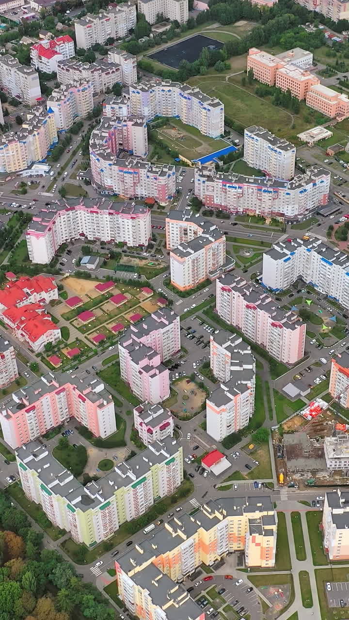 Panoramic view of the city. Modern high-rise buildings in the cityscape. New architectures in the urban district. Aerial view Vertical video