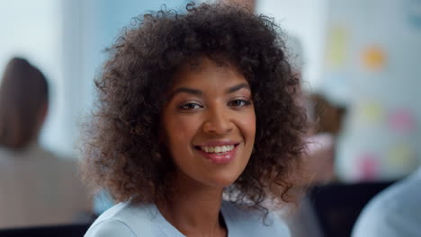 businesswoman looking at camera. smiling lady with positive face expression