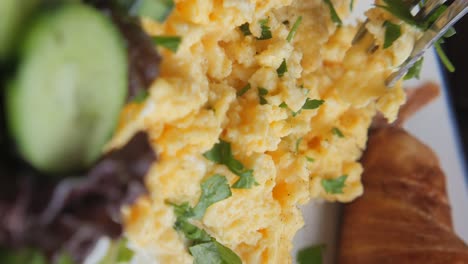 close-up of scrambled eggs with parsley