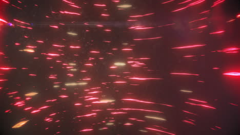 animación de rastros de luz roja y amarilla girando contra un fondo negro
