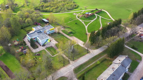 aerial view of modern building in rural setting